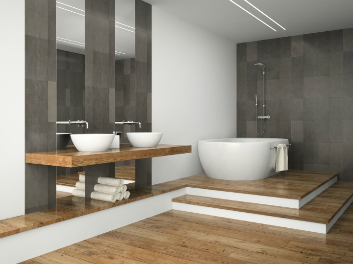Grey bathroom tiles with wood sink base