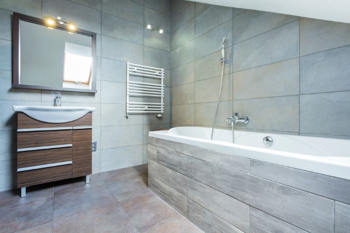 A small bathroom made to feel larger with good use of tiles