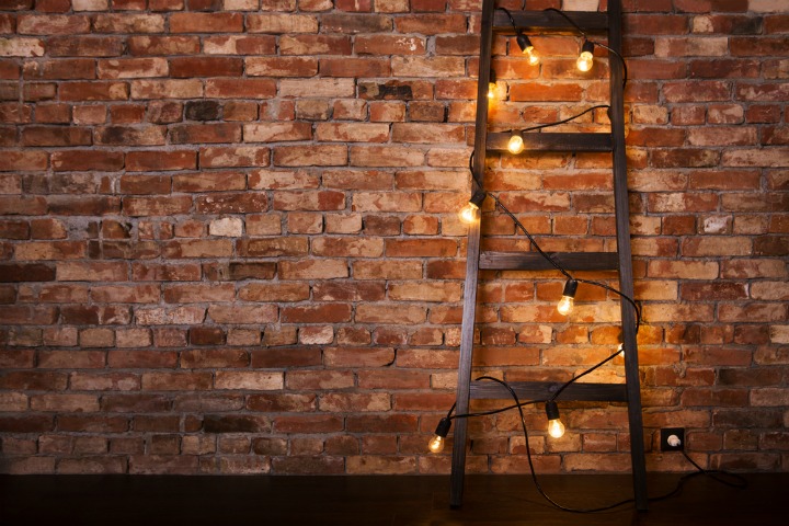 rustic bathroom with brick wall